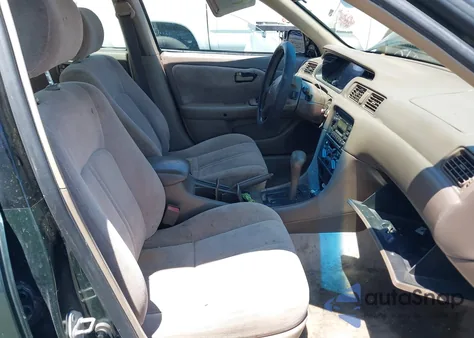 1999 Toyota Camry Le from USA, damaged, VIN 4T1BG22KXXU888043